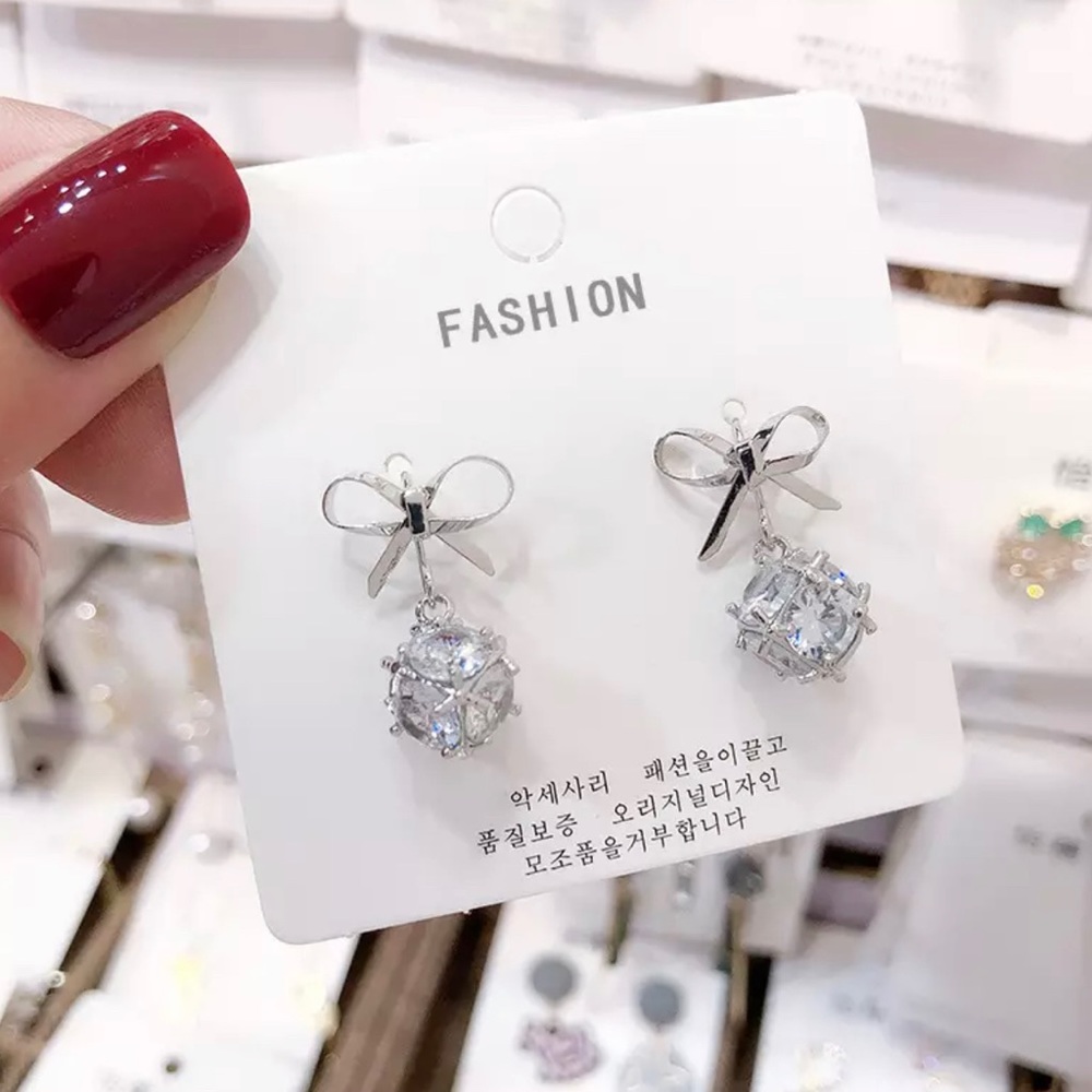 3/$30 Silver Bow Drop Earrings - Picture 5 of 8